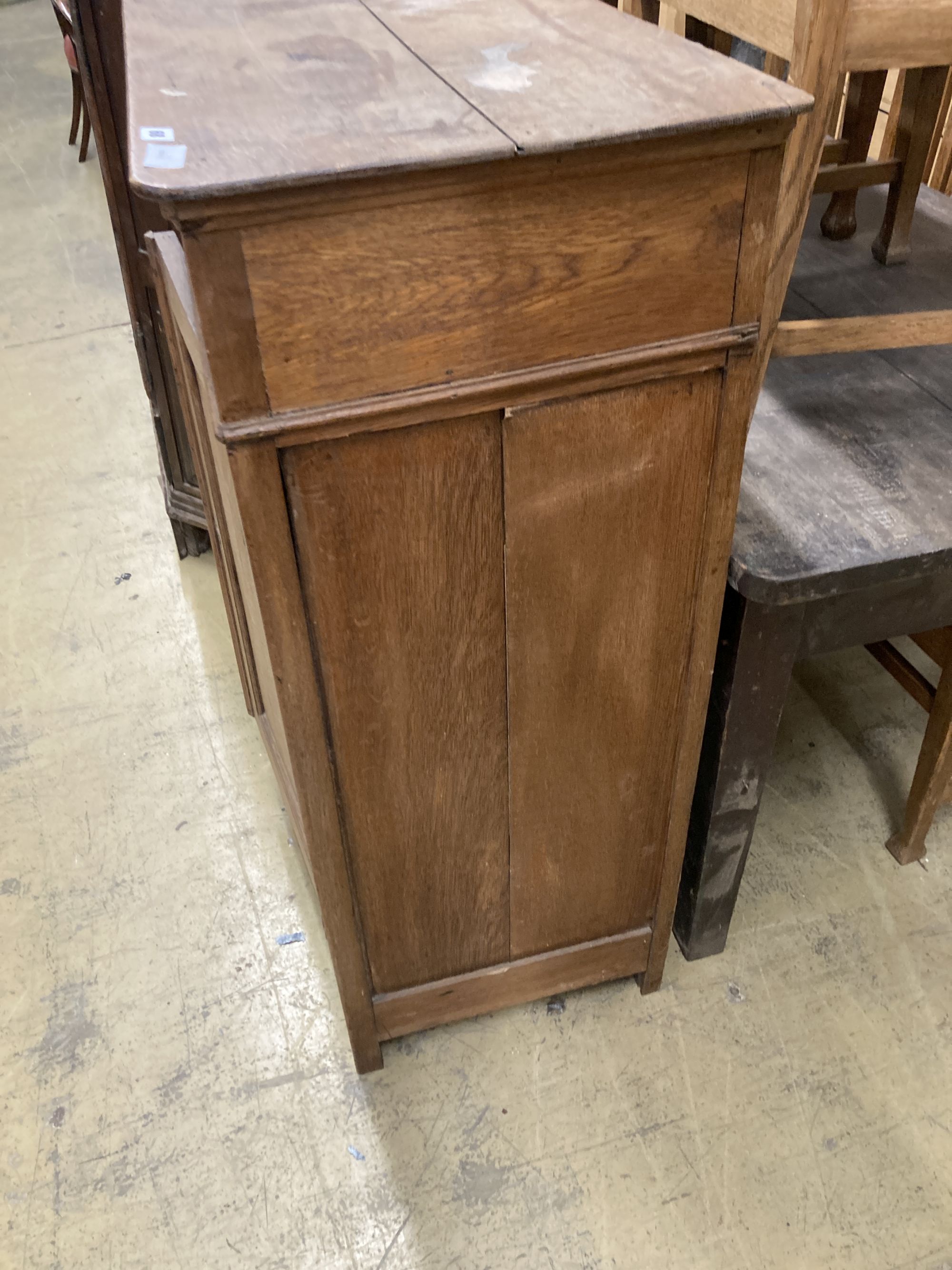 A 19th century Continental oak side cabinet